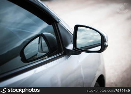 side of car door mirror glass