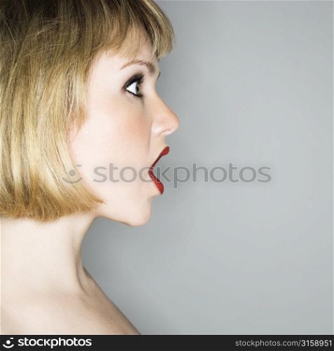 Side portrait of shocked girl