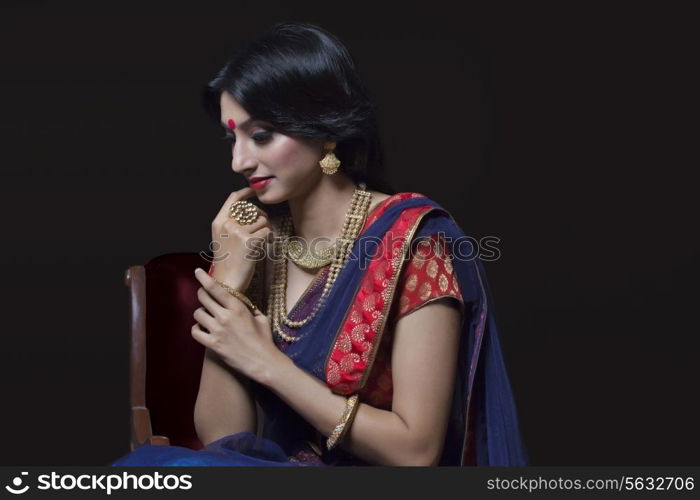 Side profile of a beautiful bride with jewelery