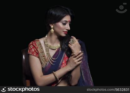 Side profile of a beautiful bride with jewelery
