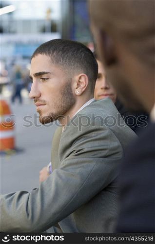 Side profile of a businessman thinking