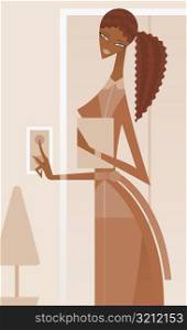 Side profile of a businesswoman pressing a doorbell