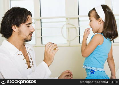 Side profile of a father with his daughter