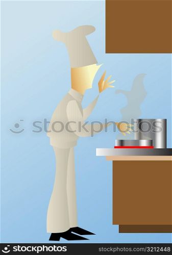 Side profile of a male chef working in a kitchen