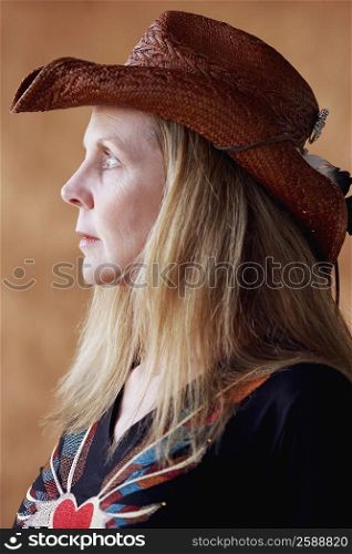 Side profile of a mature woman looking serious