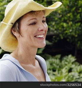 Side profile of a mature woman smiling