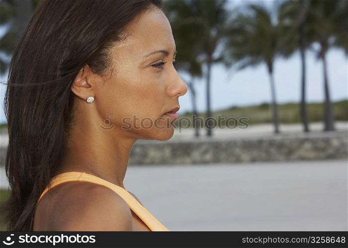 Side profile of a mature woman thinking, South Beach, Miami Beach, Florida, USA