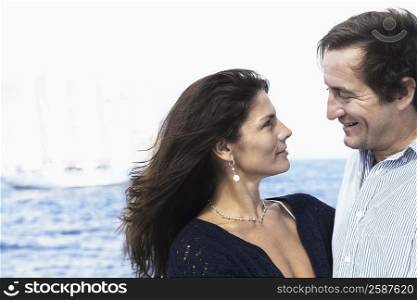 Side profile of a mid adult couple looking at each other