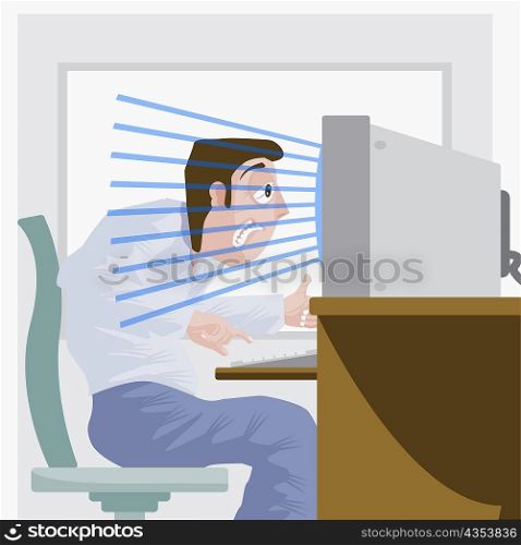 Side profile of a mid adult man sitting in front of computer with radiation emitting from it