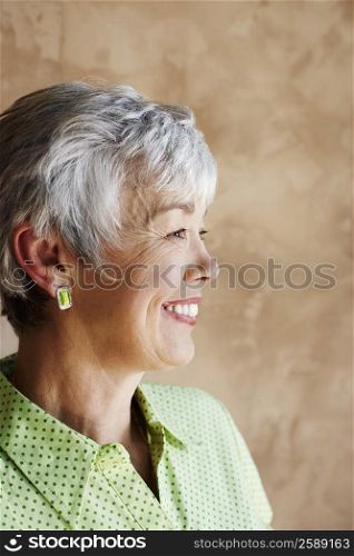Side profile of a senior woman smiling