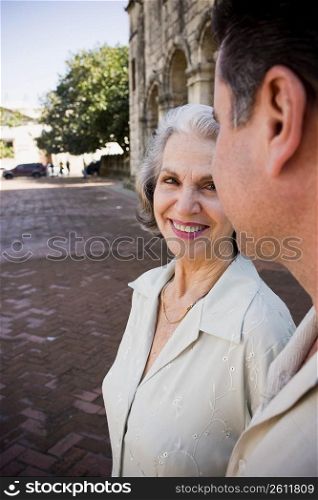 Side profile of a senior woman smiling with her son, Santo Domingo, Dominican Republic