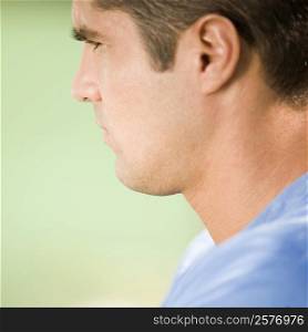 Side profile of a serious mid adult man