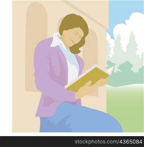 Side profile of a woman reading a book