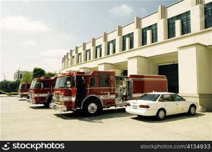 Side profile of fire engines at a fire department, Beverly Hills Fire Department, Los Angeles, California, USA