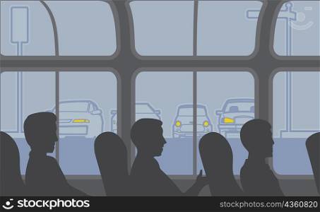 Side profile of three people sitting in a bus