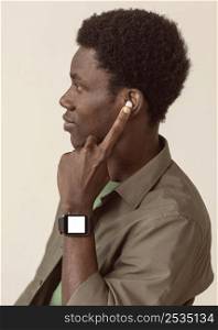 side view afro american man wearing modern air pods