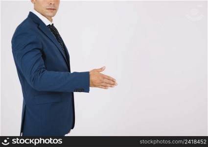 side view businessman reaching out hand