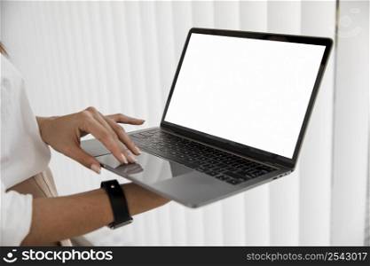 side view businesswoman with laptop