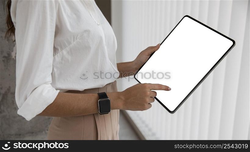 side view businesswoman with tablet