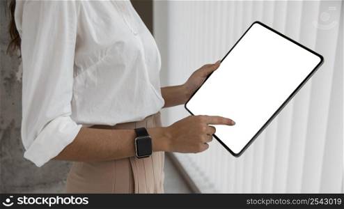 side view businesswoman with tablet