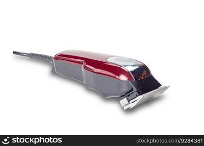 Side view closeup of professional single red corded electric hairclipper isolated on white background with clipping path.