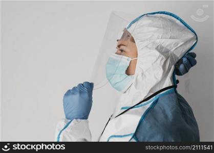 side view doctor wearing protective wear