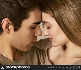 side view embraced man woman almost kissing