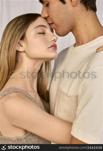side view embraced romantic couple
