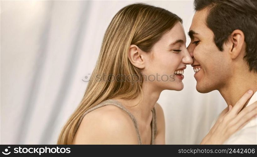 side view embraced smiley couple with copy space