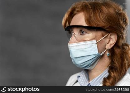 side view female doctor with medical mask copy space