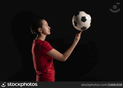 side view female with football ball
