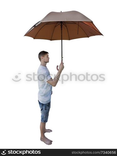 Side view full length portrait of casual young man holding umbrella as protection isolated over white background.
