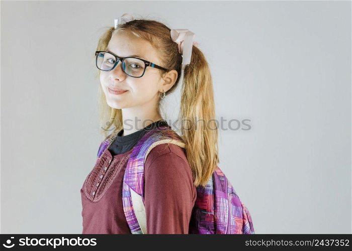 side view girl with backpack