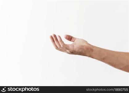 side view hand asking food donations. Resolution and high quality beautiful photo. side view hand asking food donations. High quality and resolution beautiful photo concept