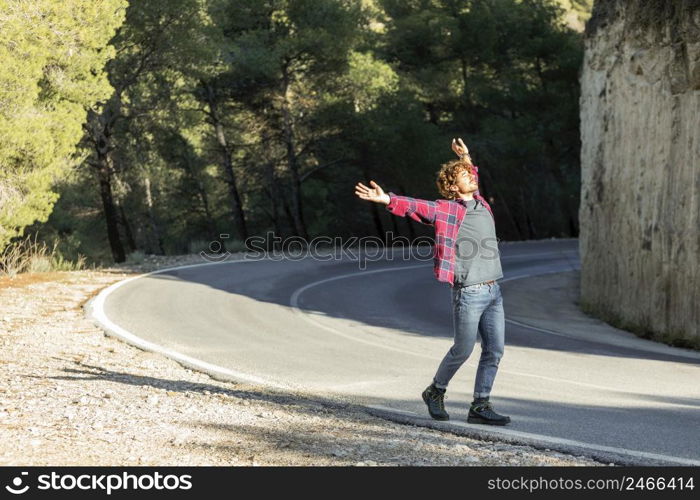 side view happy man enjoying nature while road trip