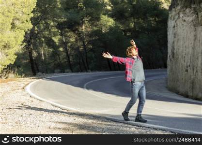 side view happy man enjoying nature while road trip