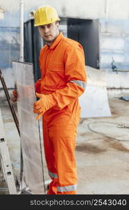 side view male laborer with hard hat