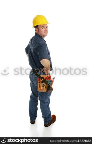 Side view of a construction worker looking over his shoulder. Full body isolated on white.