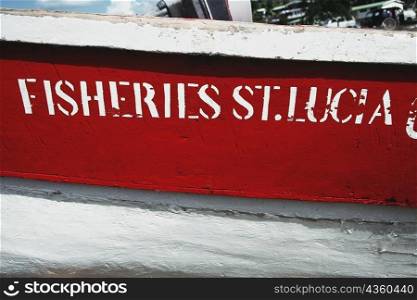Side view of a fishing boat bearing a nameplate, St. Lucia