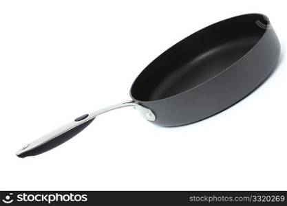 Side view of a frying pan over white.