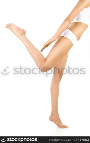 Side view of a harmonous female body in a pose, isolated