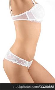 Side view of a harmonous female body in the underwear, isolated