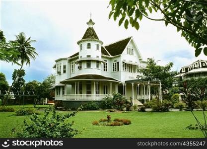 Side view of a stately mansion with a lawn in front of it, Trinidad
