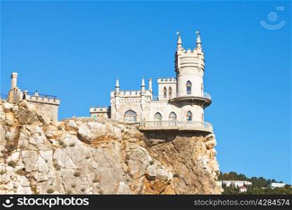 side view of Aurora rock with Swallow&rsquo;s Nest castle on Southern Coast of Crimea