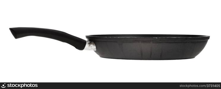 side view of big black frying pan isolated on white background