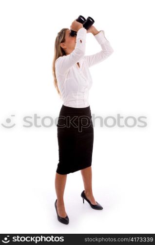 side view of businesswoman looking through binocular on an isolated white background