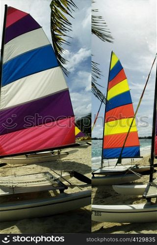 Side view of colorful sailboats on a beach, Nassau, Bahamas