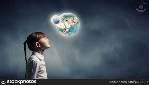 Side view of cute girl and Earth planet above her head. Elements of this image are furnished by NASA