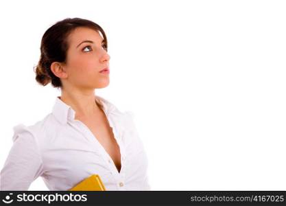 side view of female student looking sideways against white background