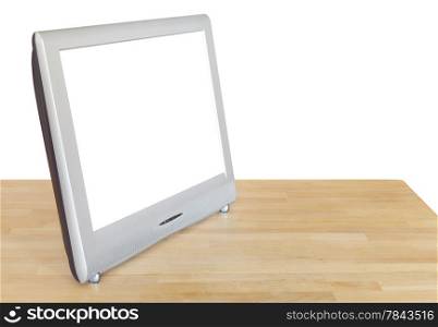 side view of grey TV set display with cut out screen on wooden table isolated on white background